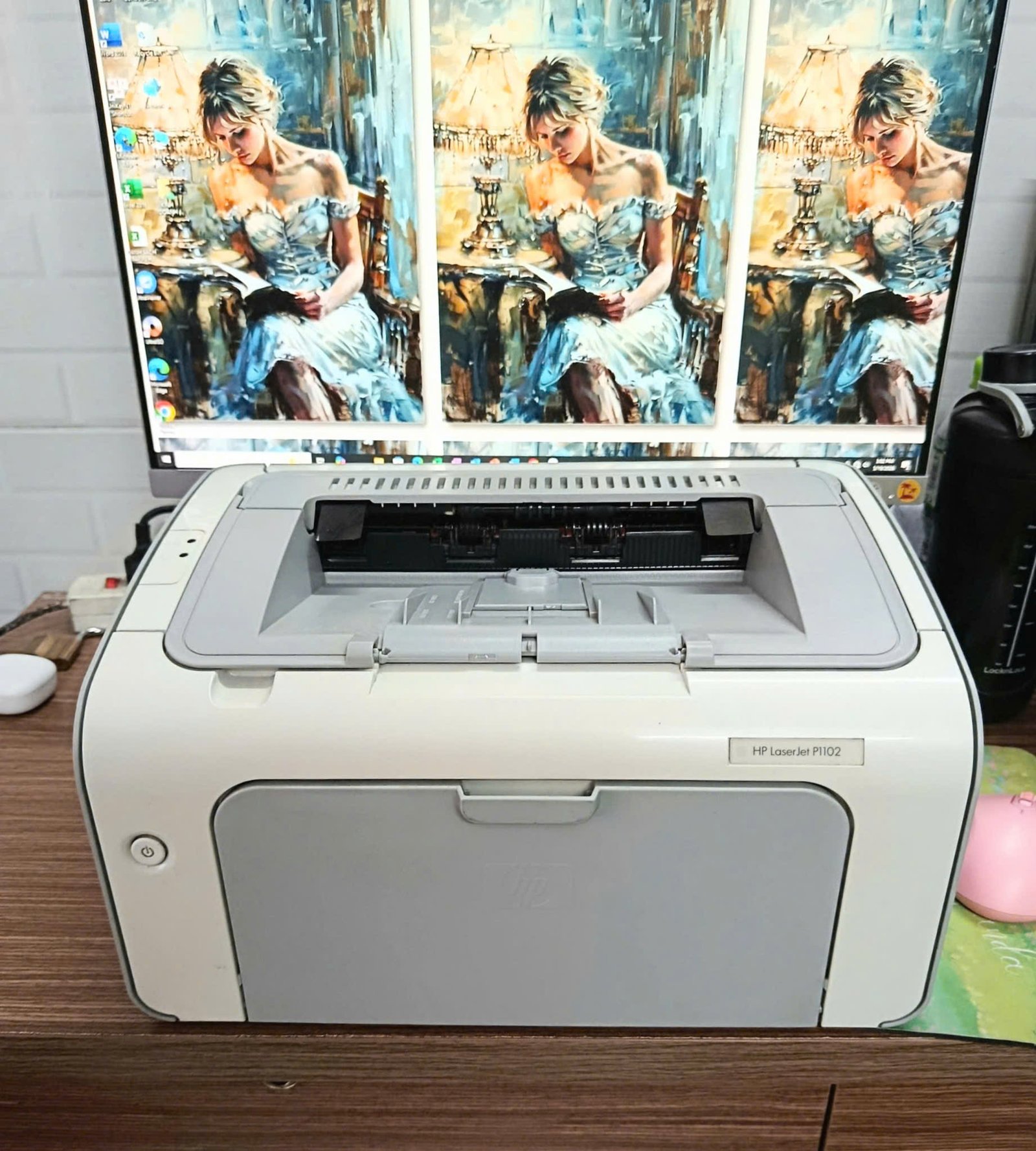 Máy in đơn năng đen trắng cũ HP 1102